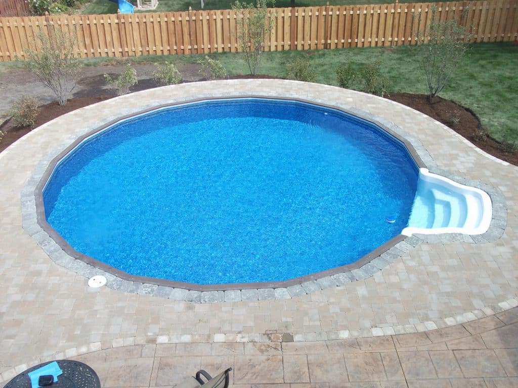 St Lawrence Pools Inground Pool with patio stone surround