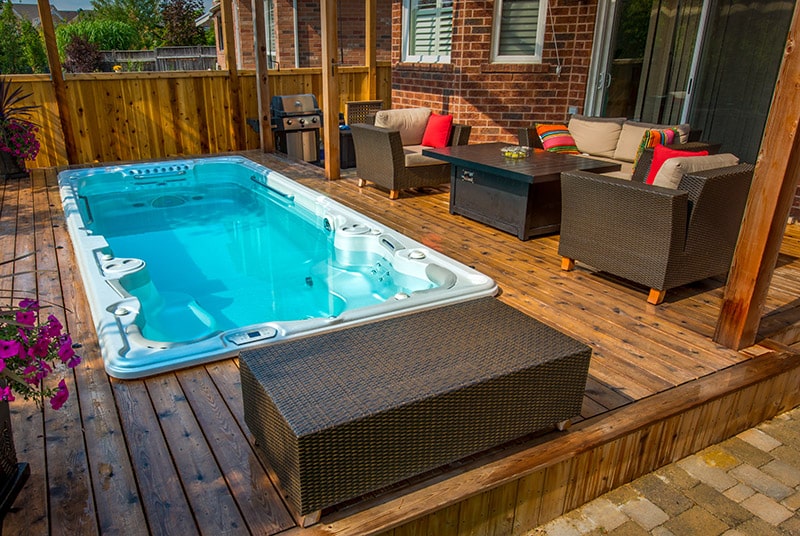 Hydropool Swim Spa with deck and patio set