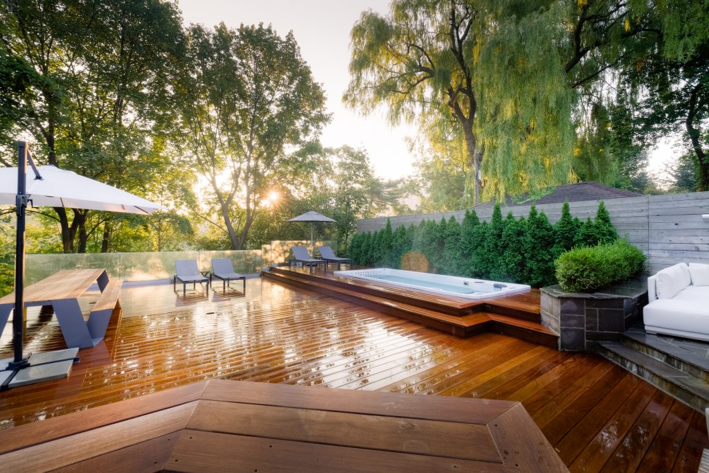 Hydropool Swim Spa with deck and landscaping