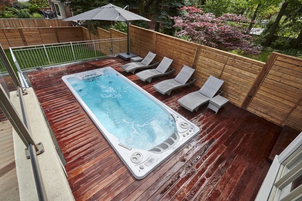 Hydropool Swim Spa with deck and loungers