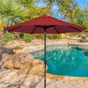 Treasure Garden 9ft Market Umbrella with Background | St. Lawrence Pools, Hot Tubs, Fitness, Billiards & Patio