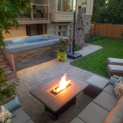 Hydropool Swim Spa with patio set and fire table